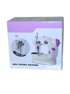NIB Mini Sewing Machine
